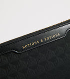 Anya Hindmarch Jacquard Logo Lotions and Potions travel pouch - British product