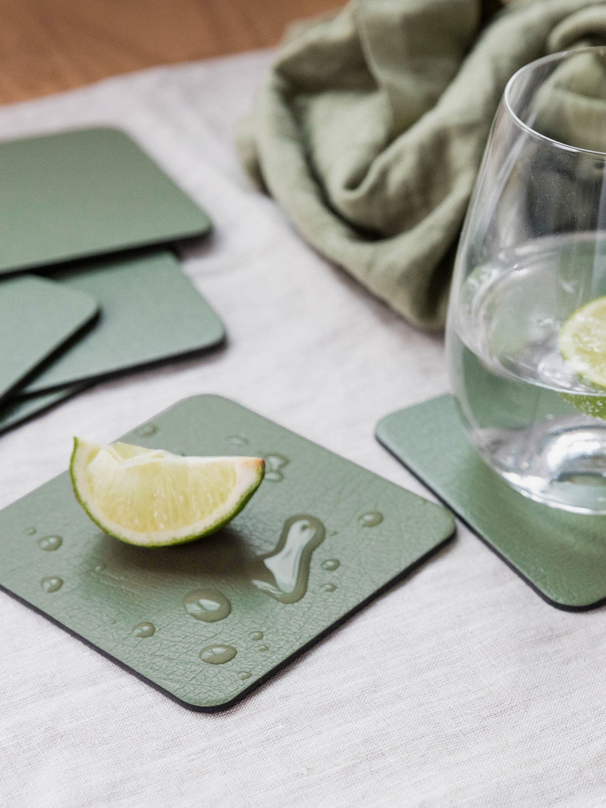 Lara-May olive green leather coasters and placemats set of 6, UK version