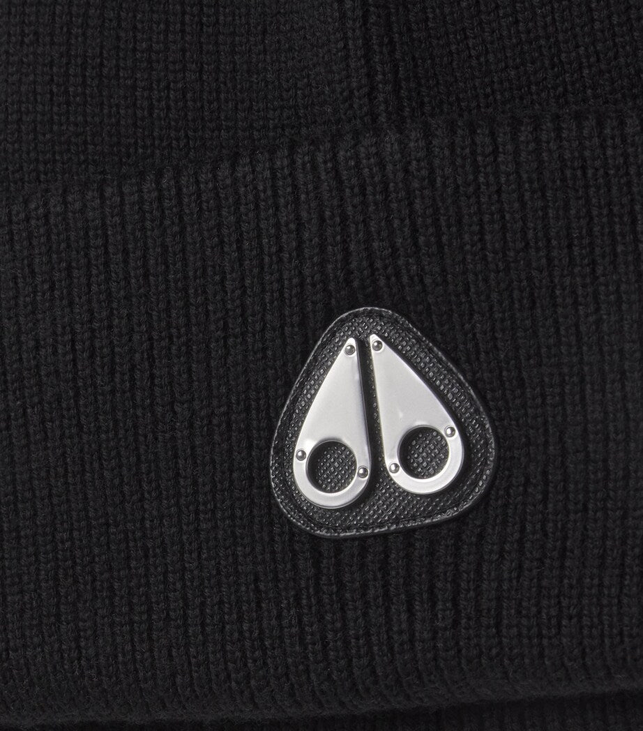 Moose Knuckles children's wool knit beanie with metal logo, imported from the UK