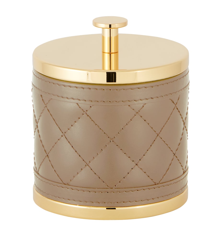 Riviere small quilted round box with leather and brass accents, imported from the UK