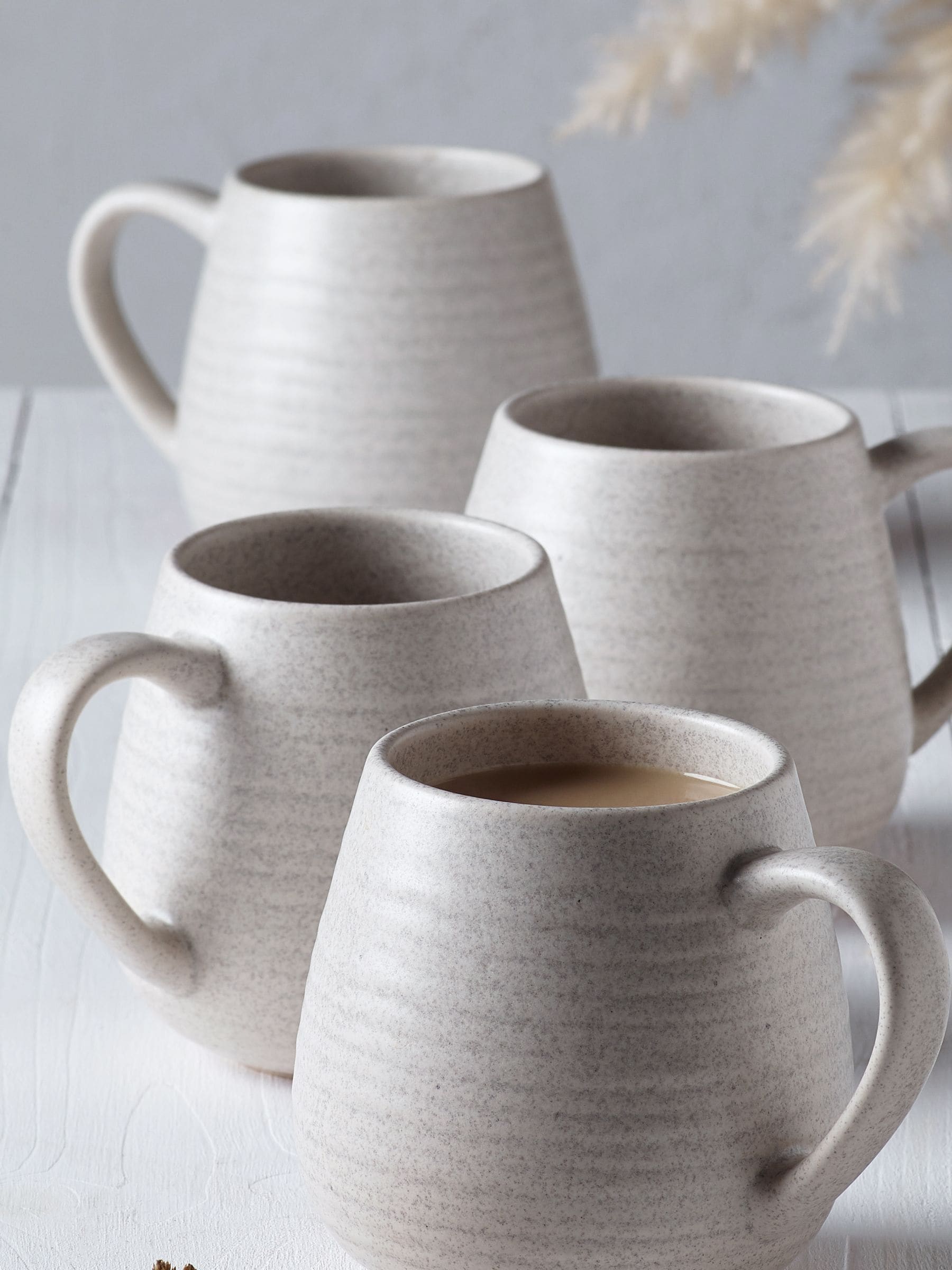 Kya stoneware mugs set of 4 with 10cm height and embossed design (British brand)