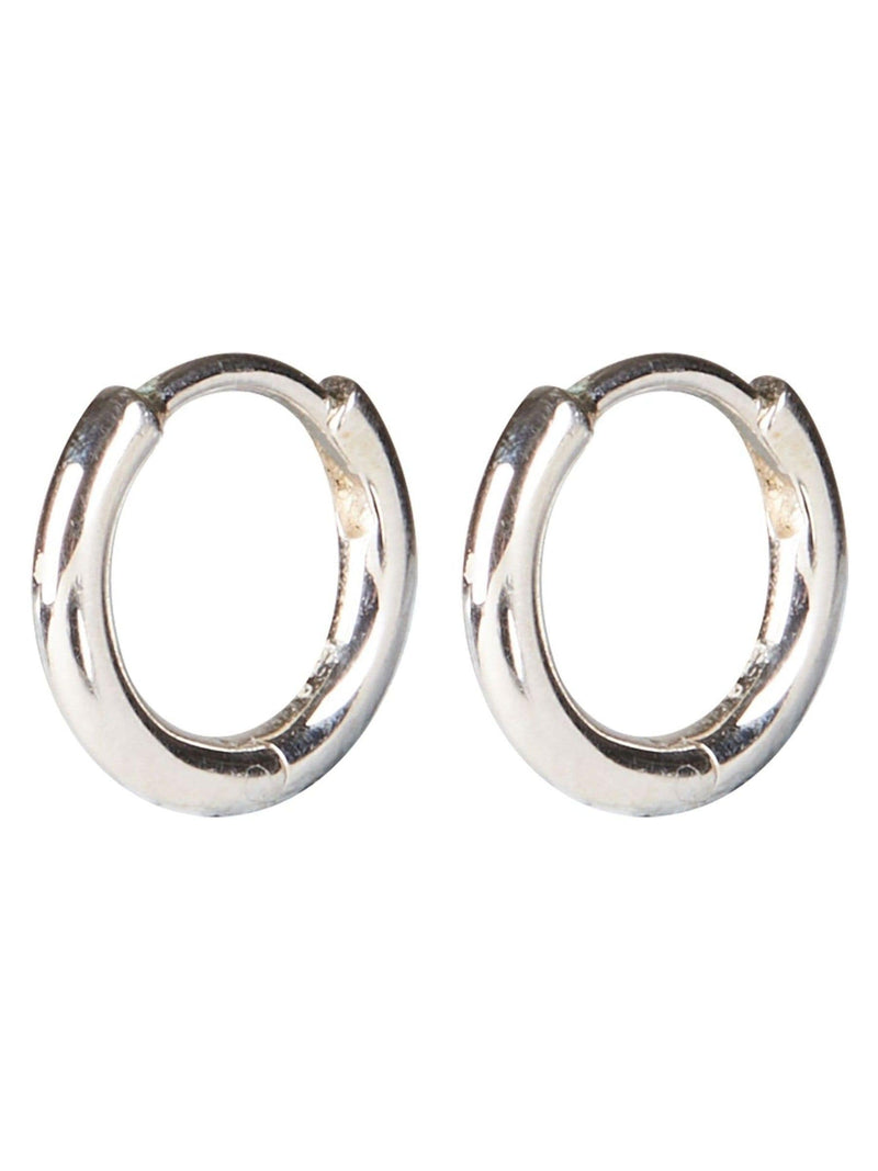 Oliver Bonas silver tone juniper mini huggie earrings, imported from the UK