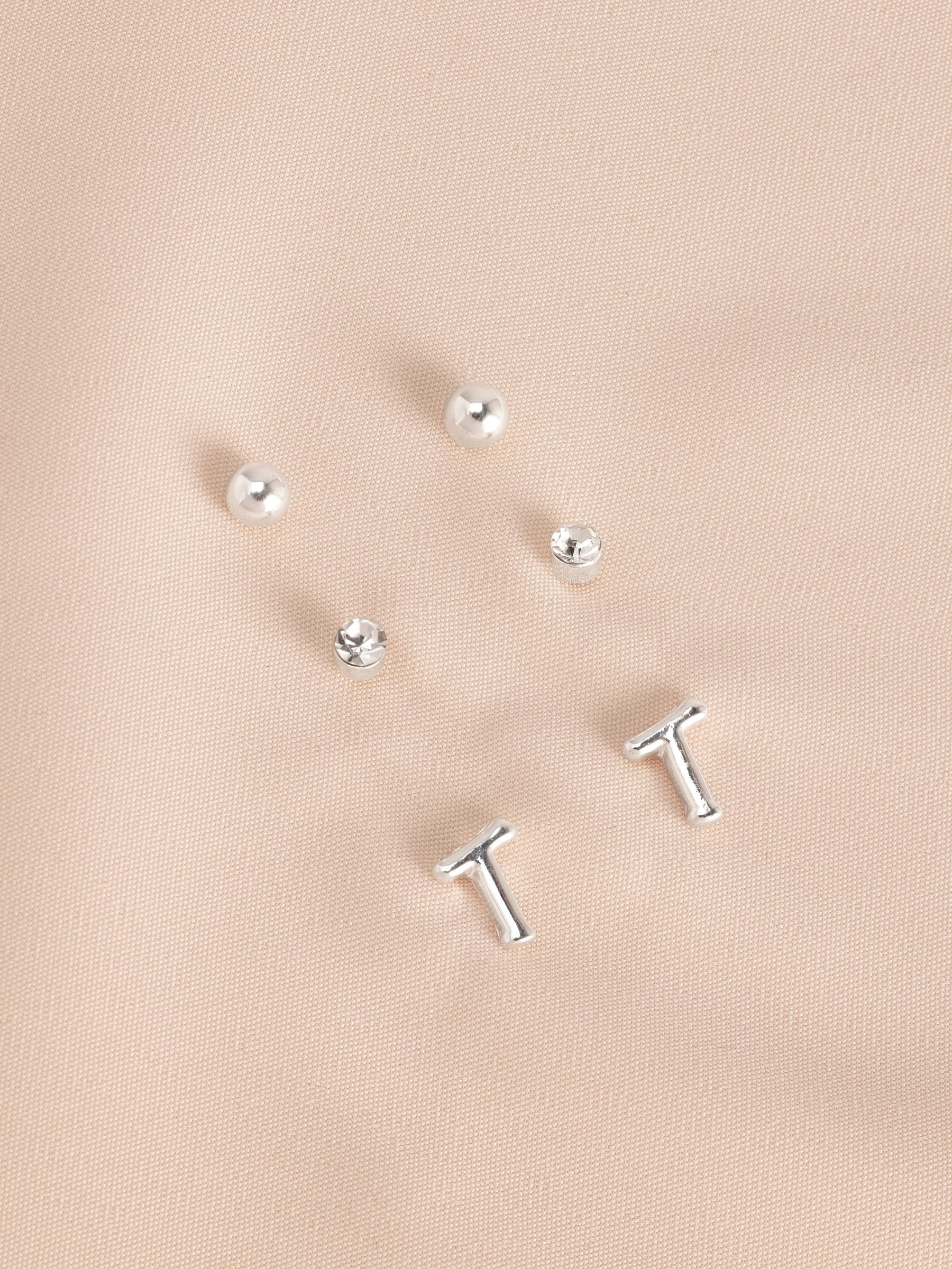 Silver tone initial stud earrings pack (British brand)