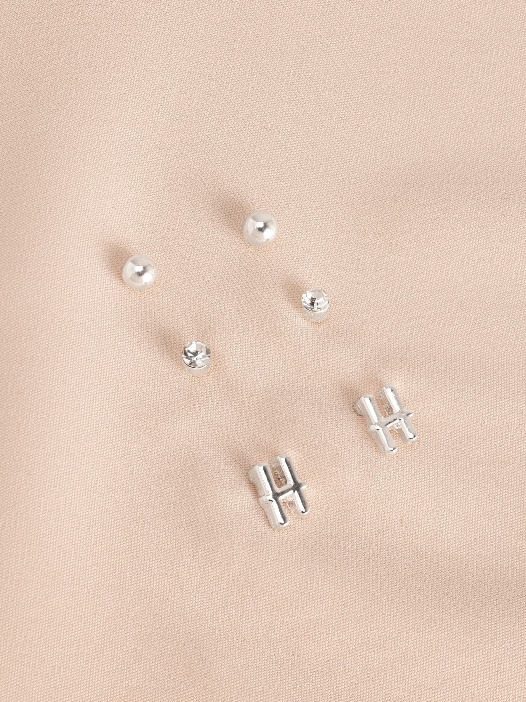 Silver tone initial stud earrings pack (British brand)