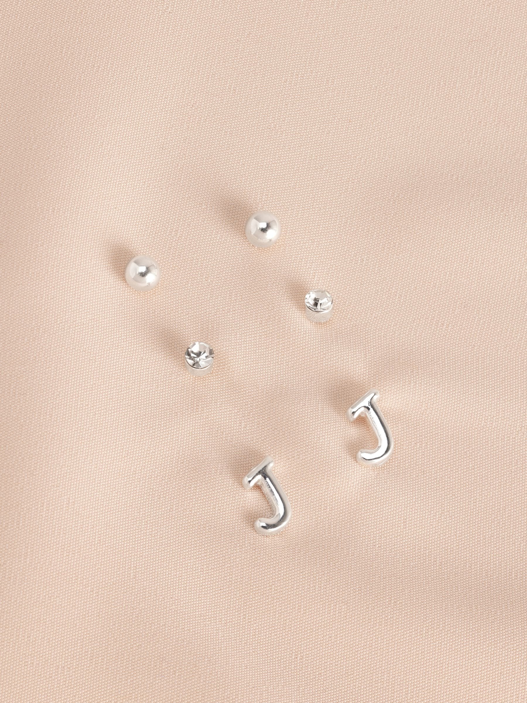 Silver tone initial stud earrings pack (British brand)