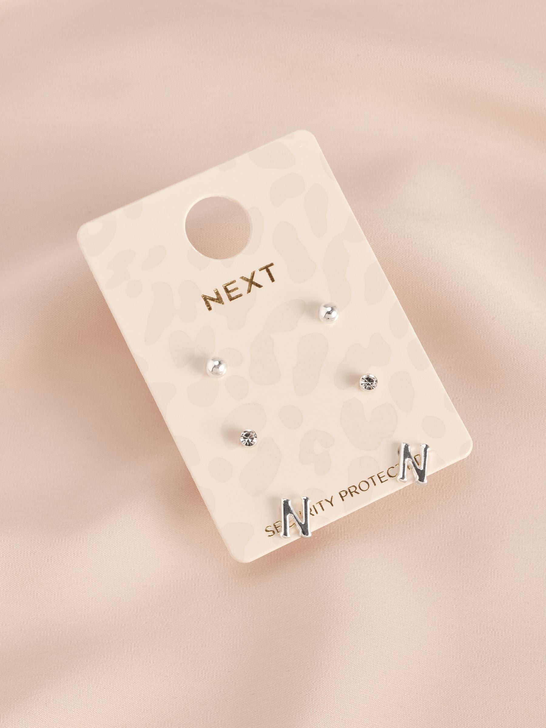 Silver tone initial stud earrings pack (British brand)