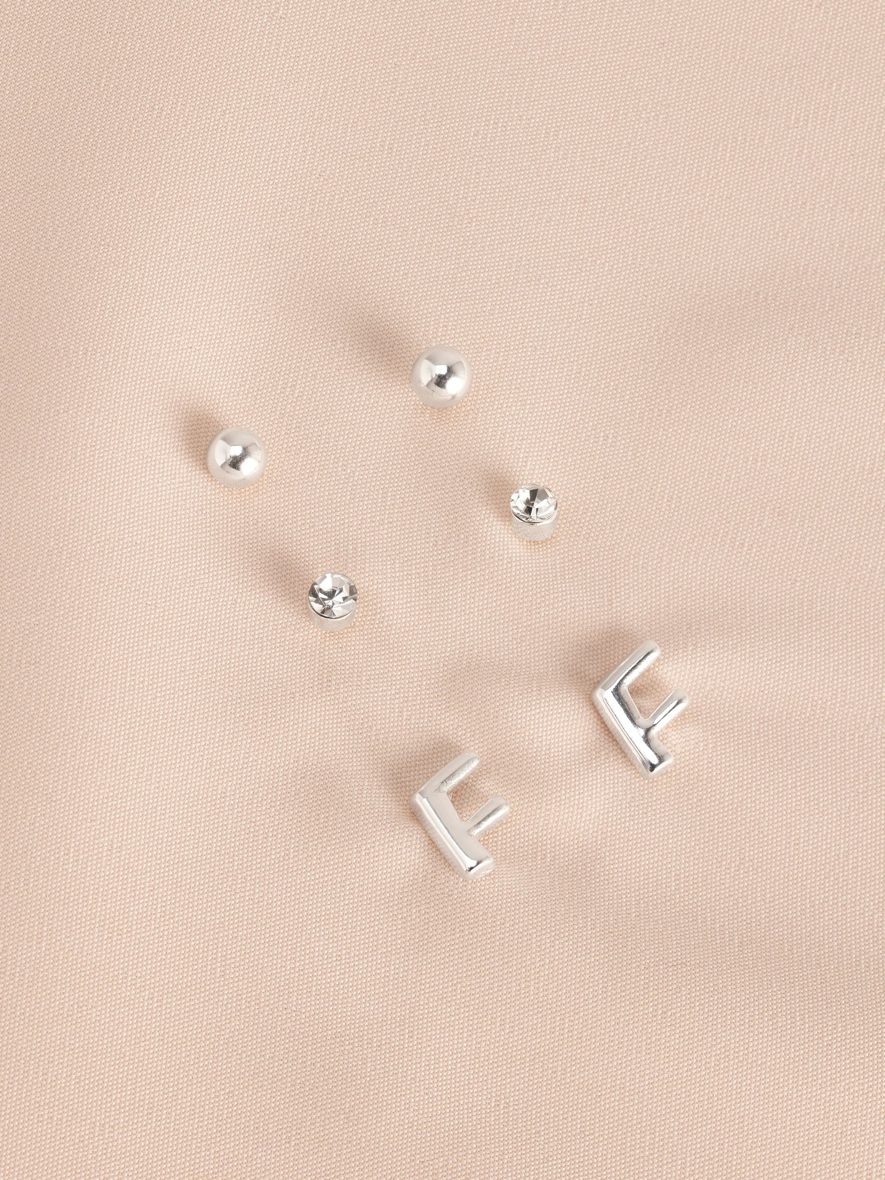 Silver tone initial stud earrings pack (British brand)