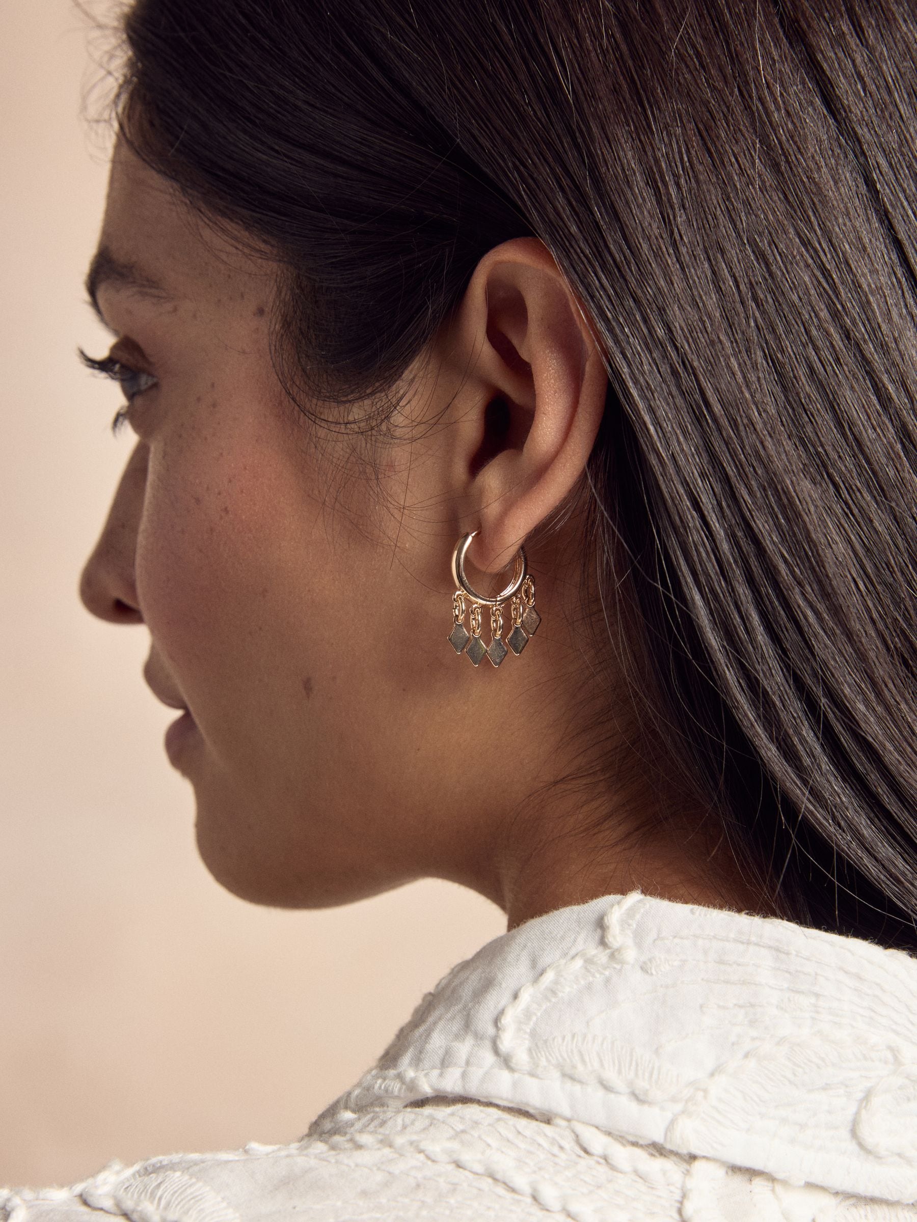 Gold tone mini charm hoop pierced earrings, UK version