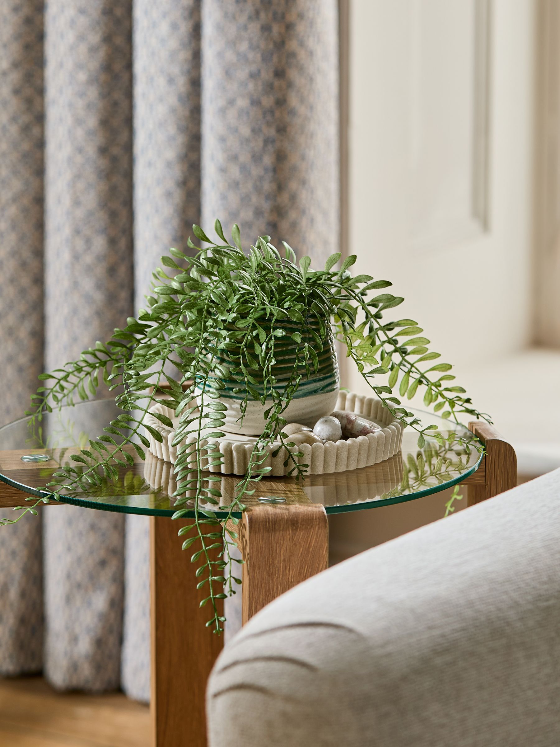 Green artificial trailing plant in reactive ceramic pot, 33cm height, UK version