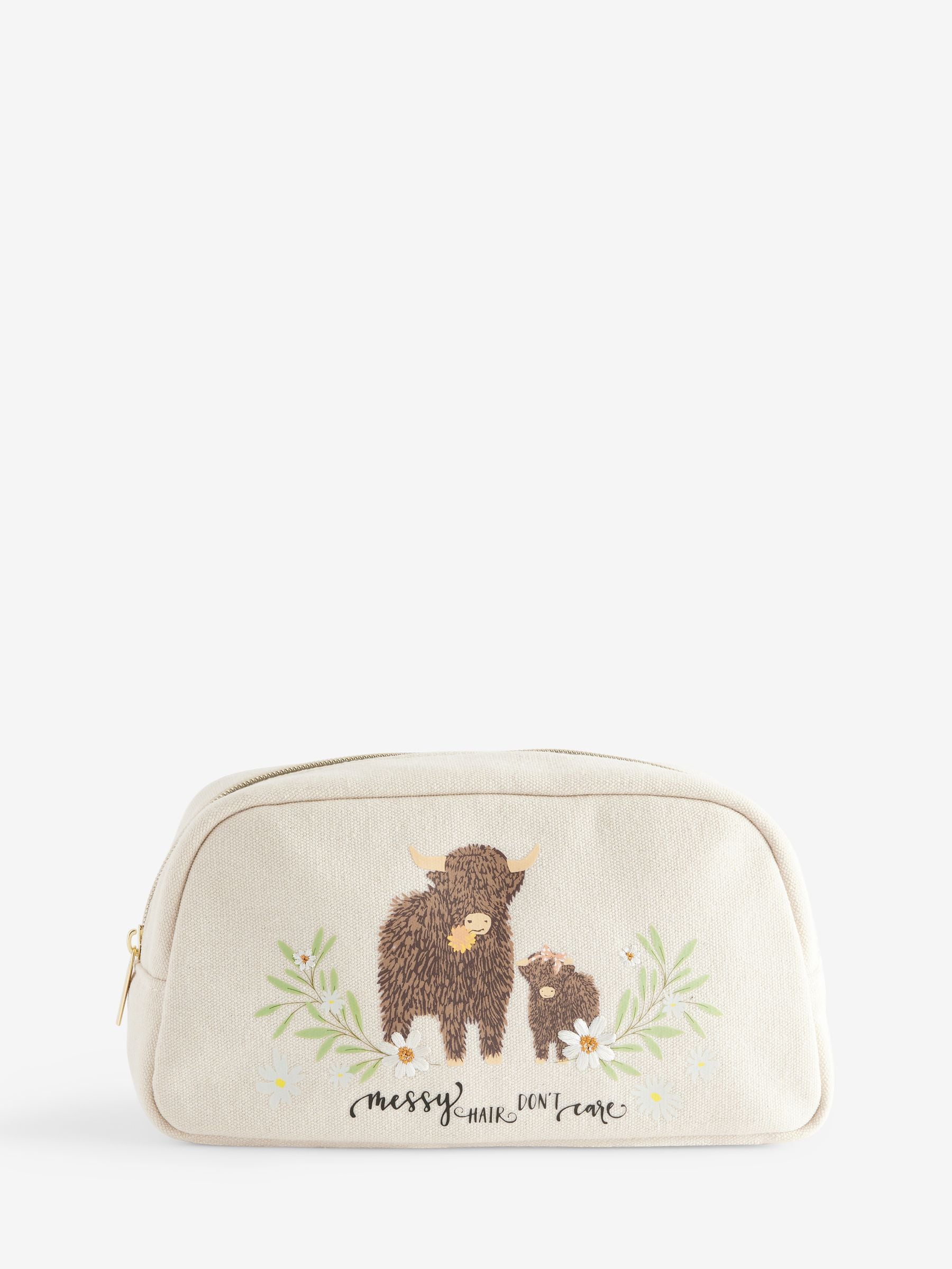 Makeup bag featuring Hamish the Highland Cow design, imported from the UK