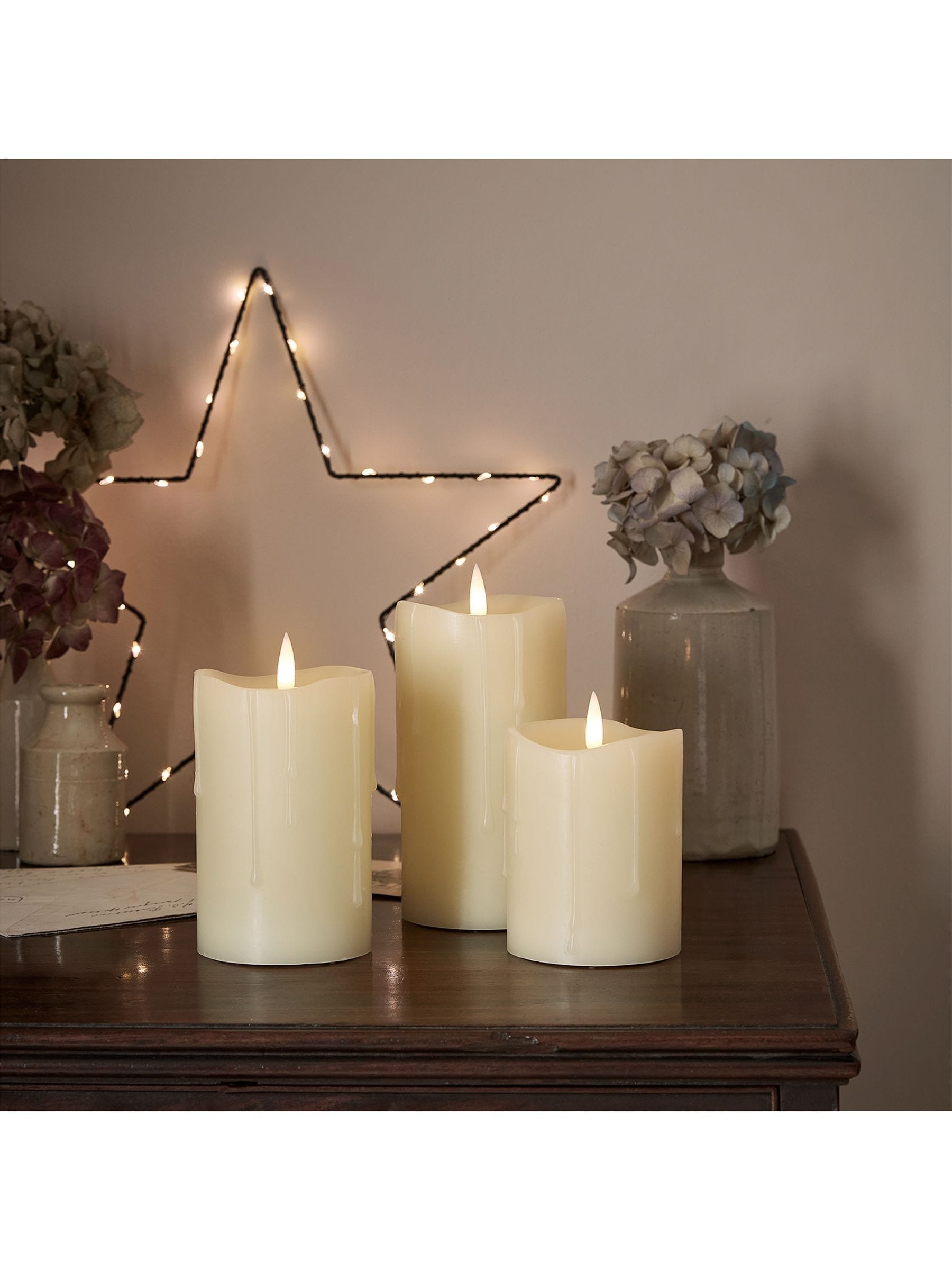 Lights4fun TruGlow Dripping Wax LED Pillar Candle Trio, UK version