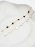 Jon Richard gold tone jet enamel clover bracelet 178mm, UK version