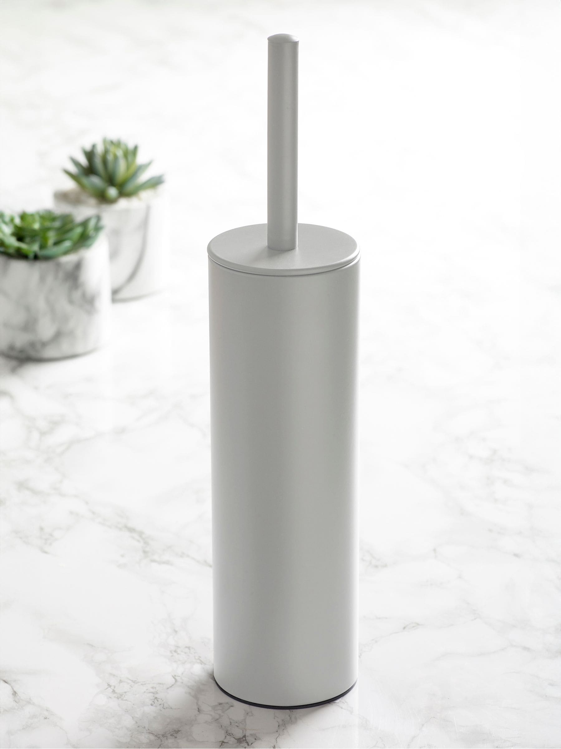Light grey metal and plastic toilet brush, UK version