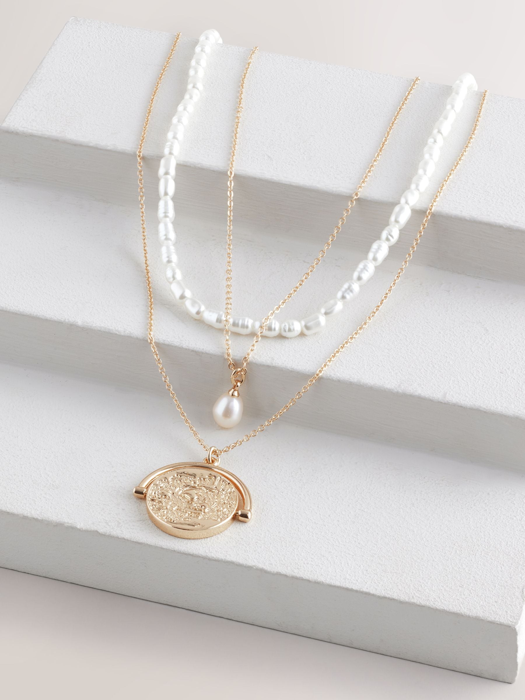 Gold tone pearl effect 3 layer necklace, UK version