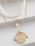 Gold tone pearl effect 3 layer necklace, UK version