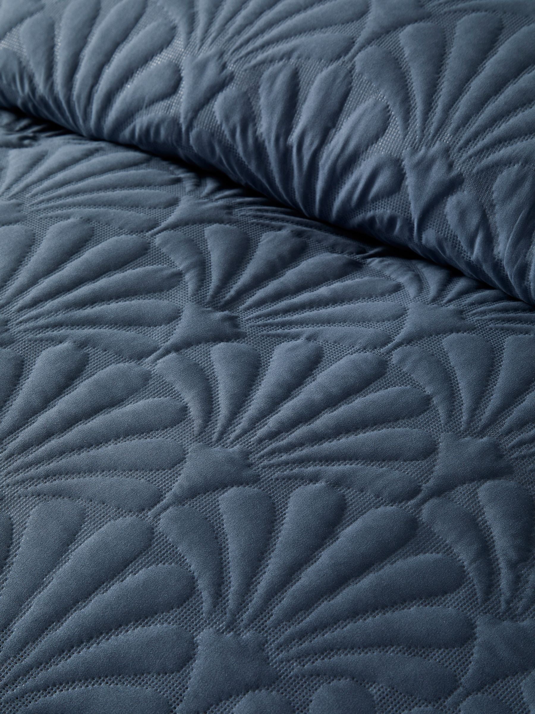Serene dark blue cavali quilted duvet cover set (British brand)