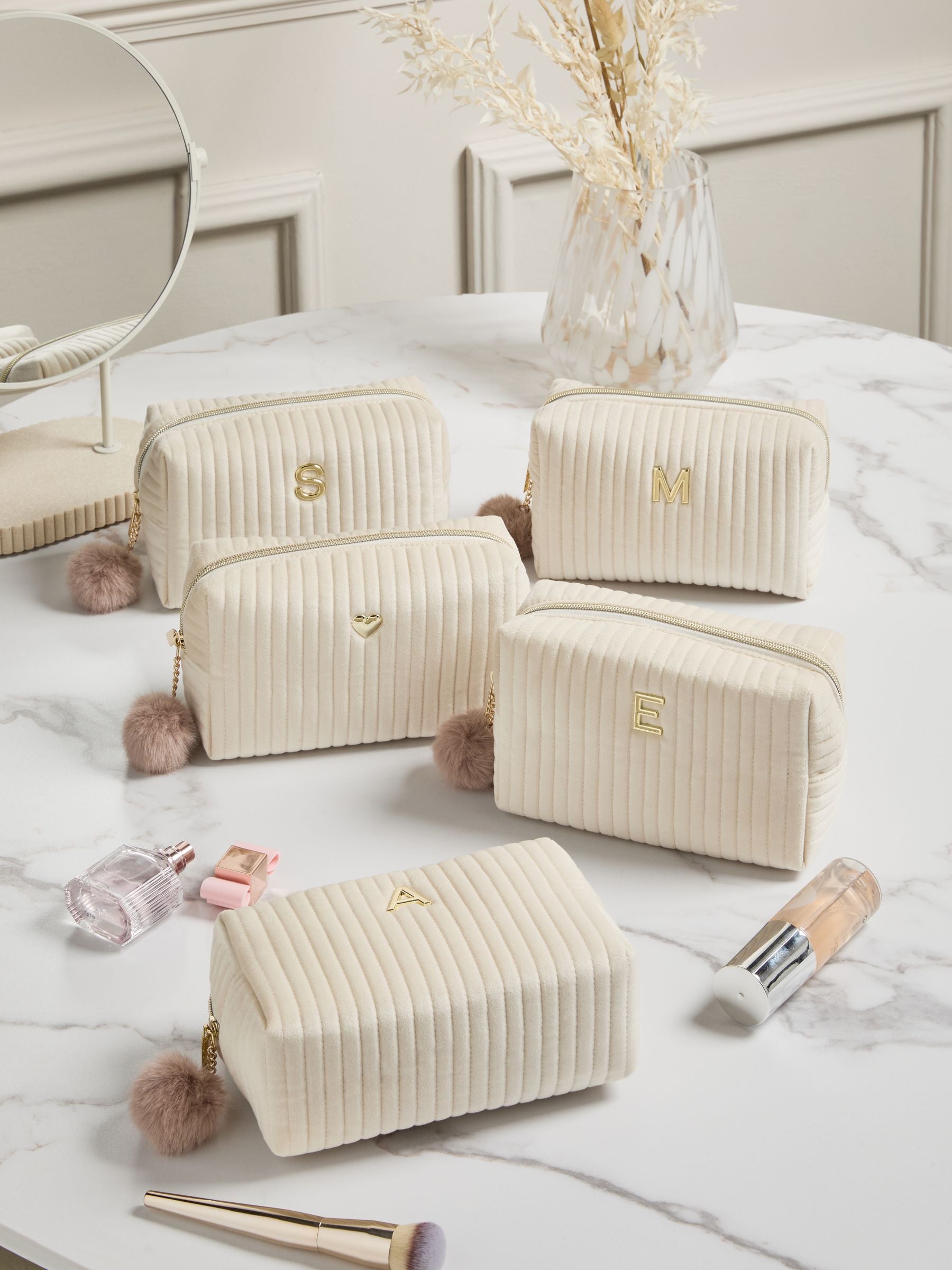 Personalised alphabet makeup bag in ribbed velvet, imported from the UK