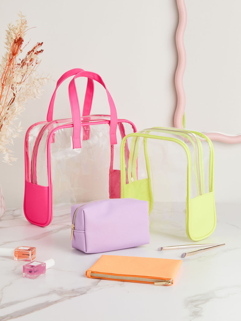 Set of four clear makeup bags in assorted sizes (British brand)