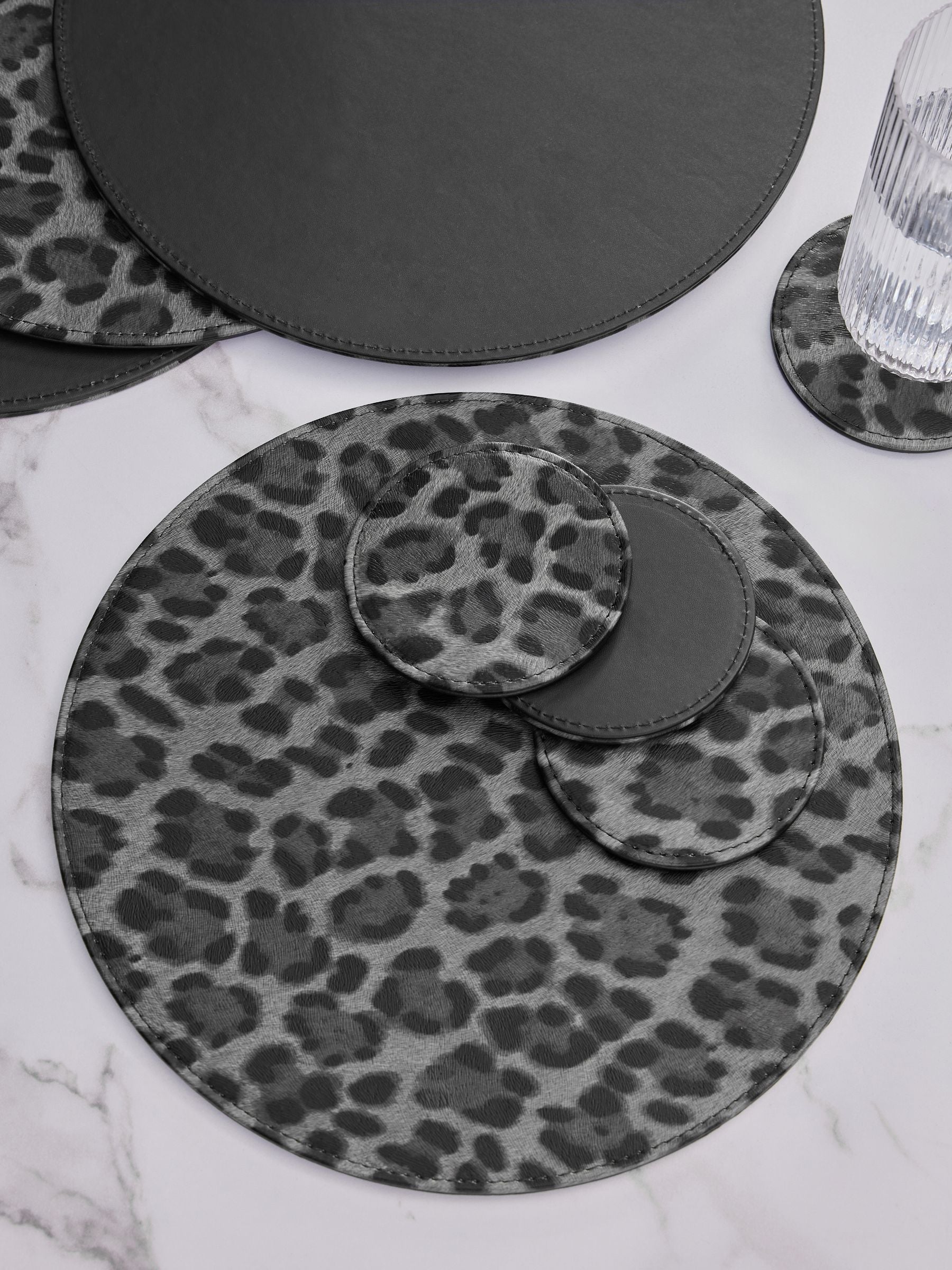 Set of 4 Black Leopard Printed Faux Leather Placemats and Coasters
