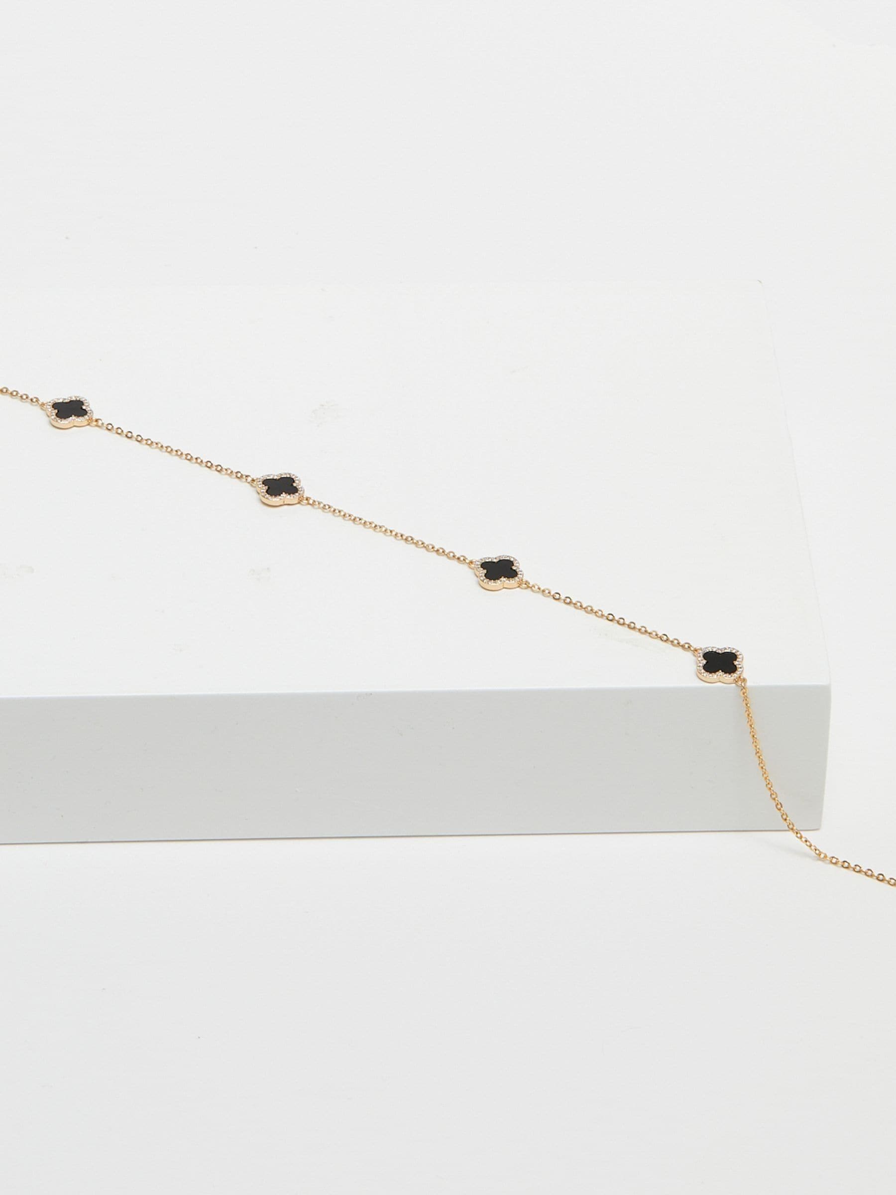 Jon Richard black plated clover necklace, UK version