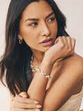 Gold tone sparkle pearl effect pully bracelet, UK version