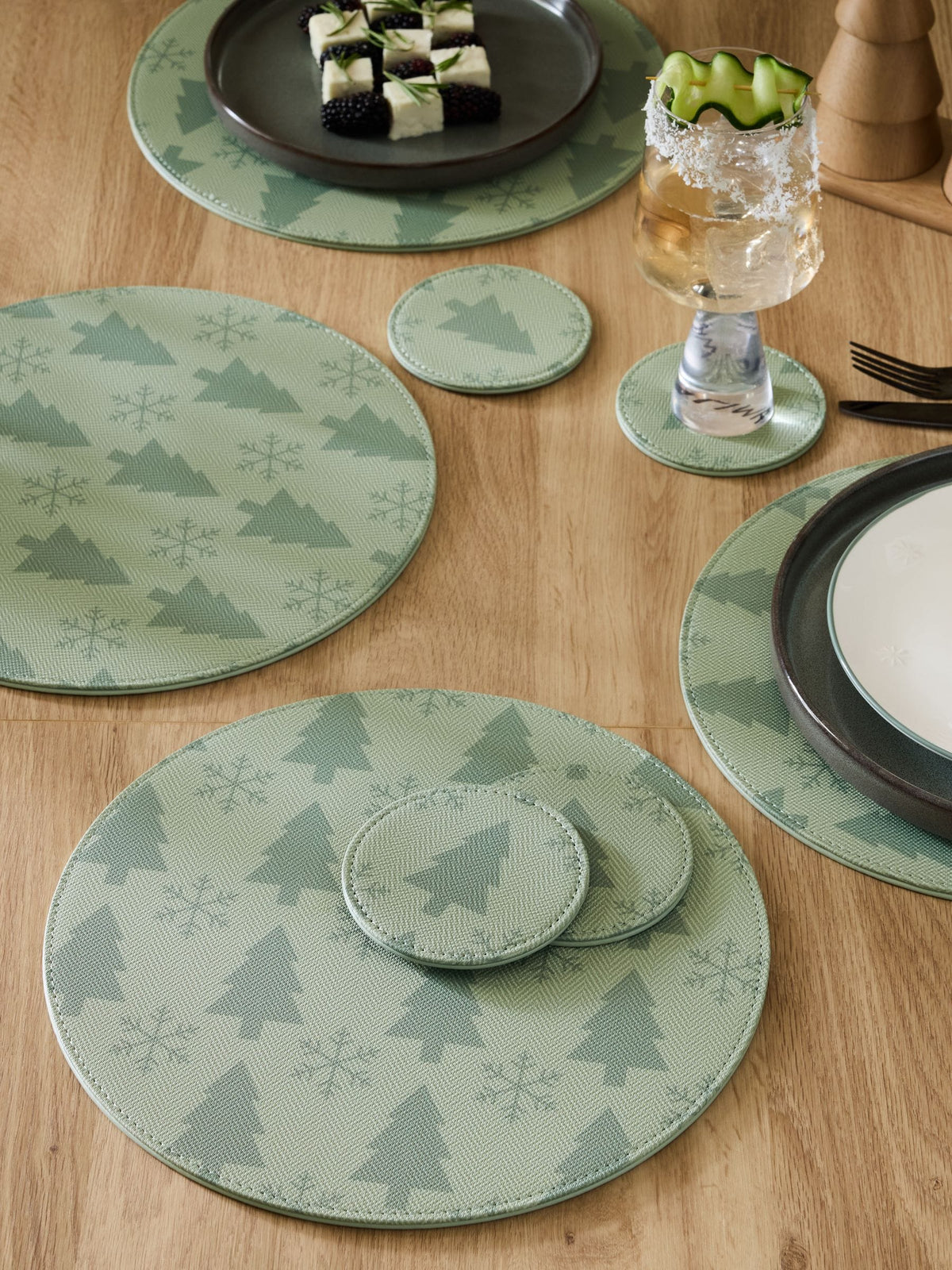 Green Christmas tree printed faux leather placemats and coasters set of 4 (British brand)