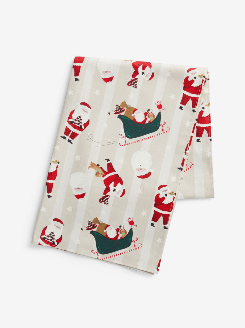 Red Christmas Santa Print Wipe Clean Tablecloth, imported from the UK