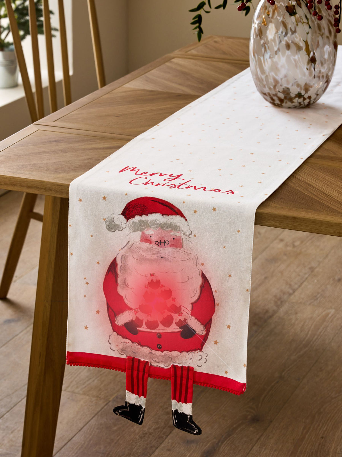 Red Santa Musical Light Up Table Runner, imported from the UK