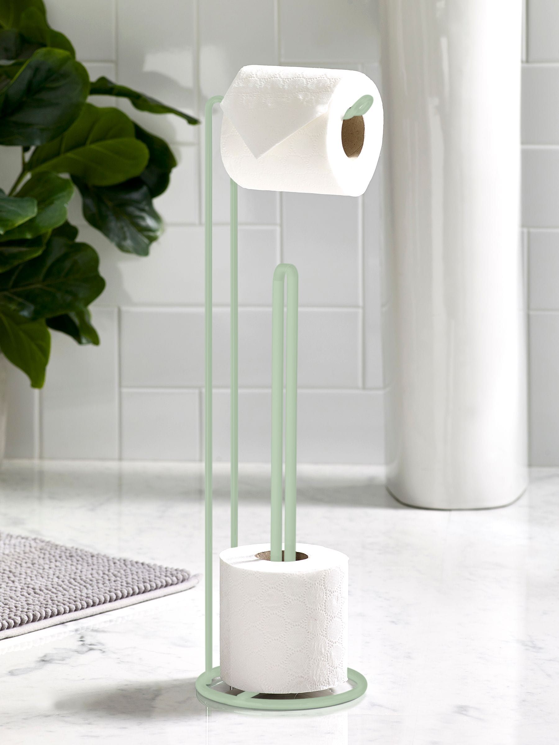 Wire toilet roll holder storing four toilet rolls, UK version