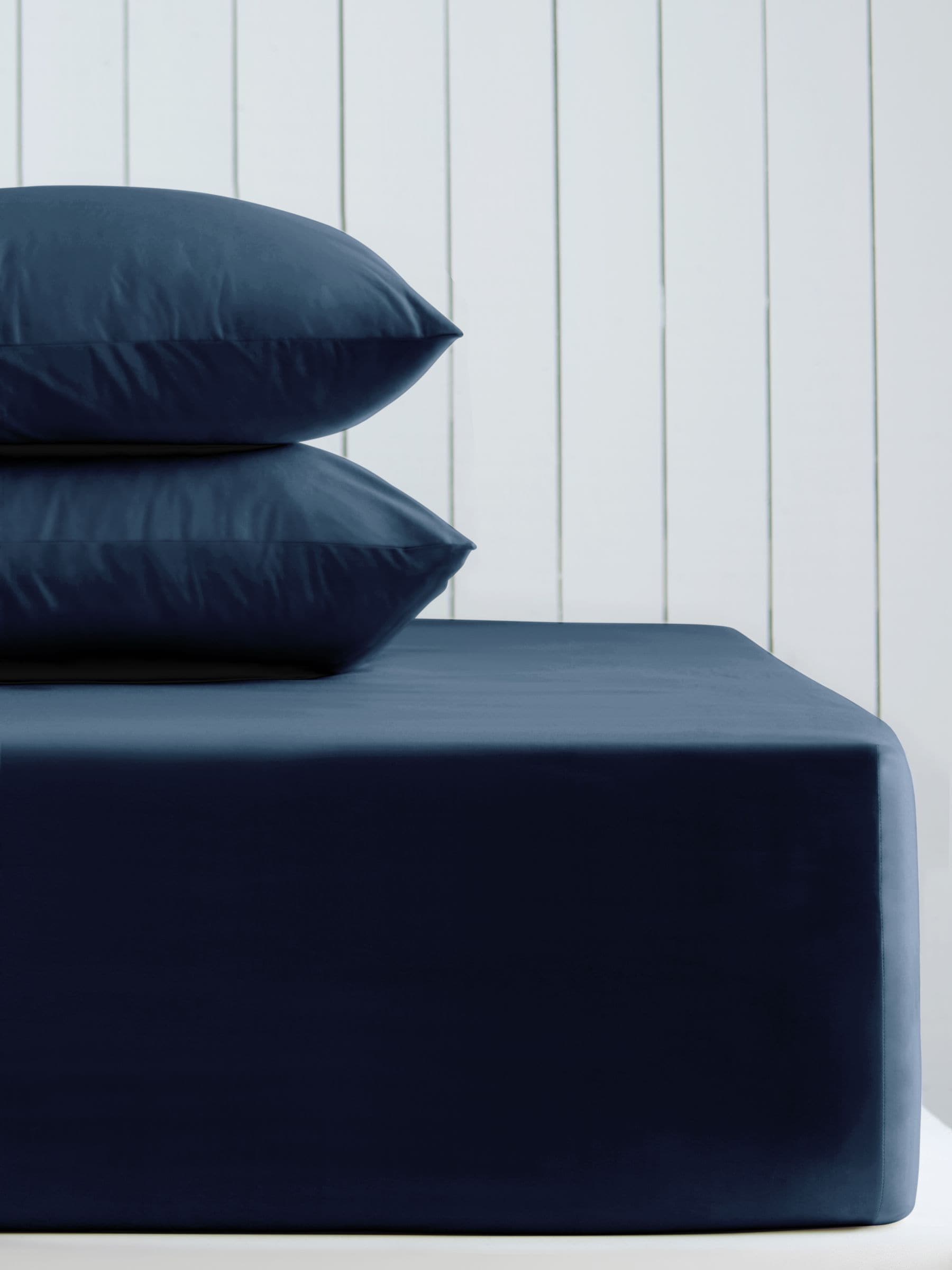 Navy blue cotton fitted bed sheet, imported from the UK