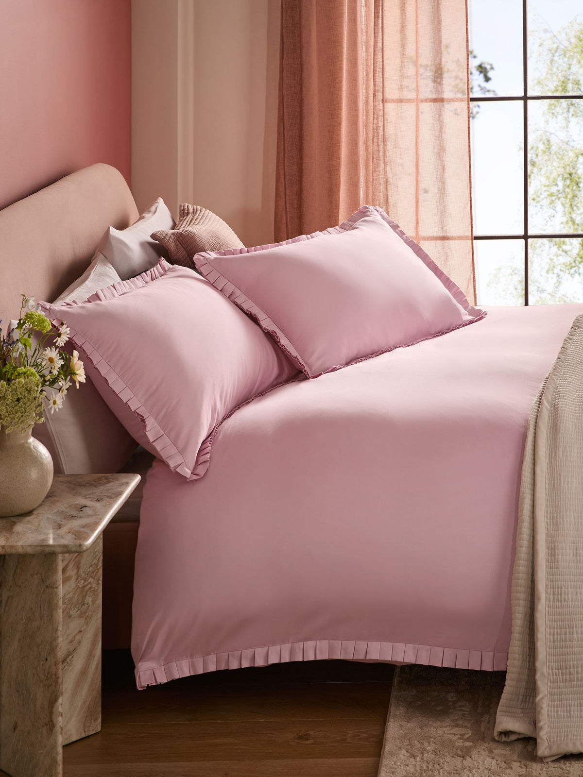 Pink box pleat duvet cover and pillowcase set with 200 thread count cotton, imported from the UK