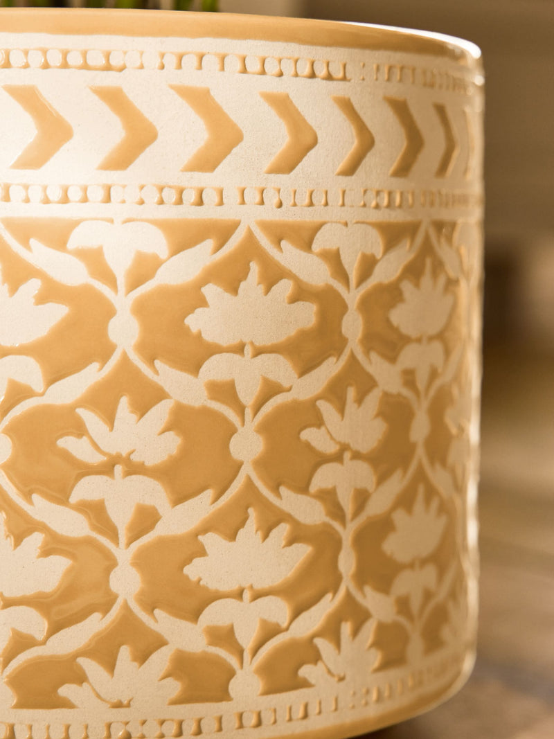Nina Campbell Ochre Lotus stoneware plant pot with embossed leaf design, imported from the UK.