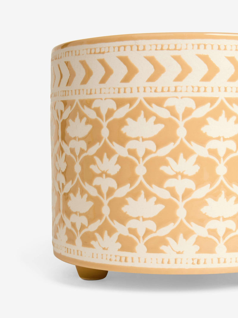 Nina Campbell Ochre Lotus stoneware plant pot with embossed leaf design, imported from the UK.