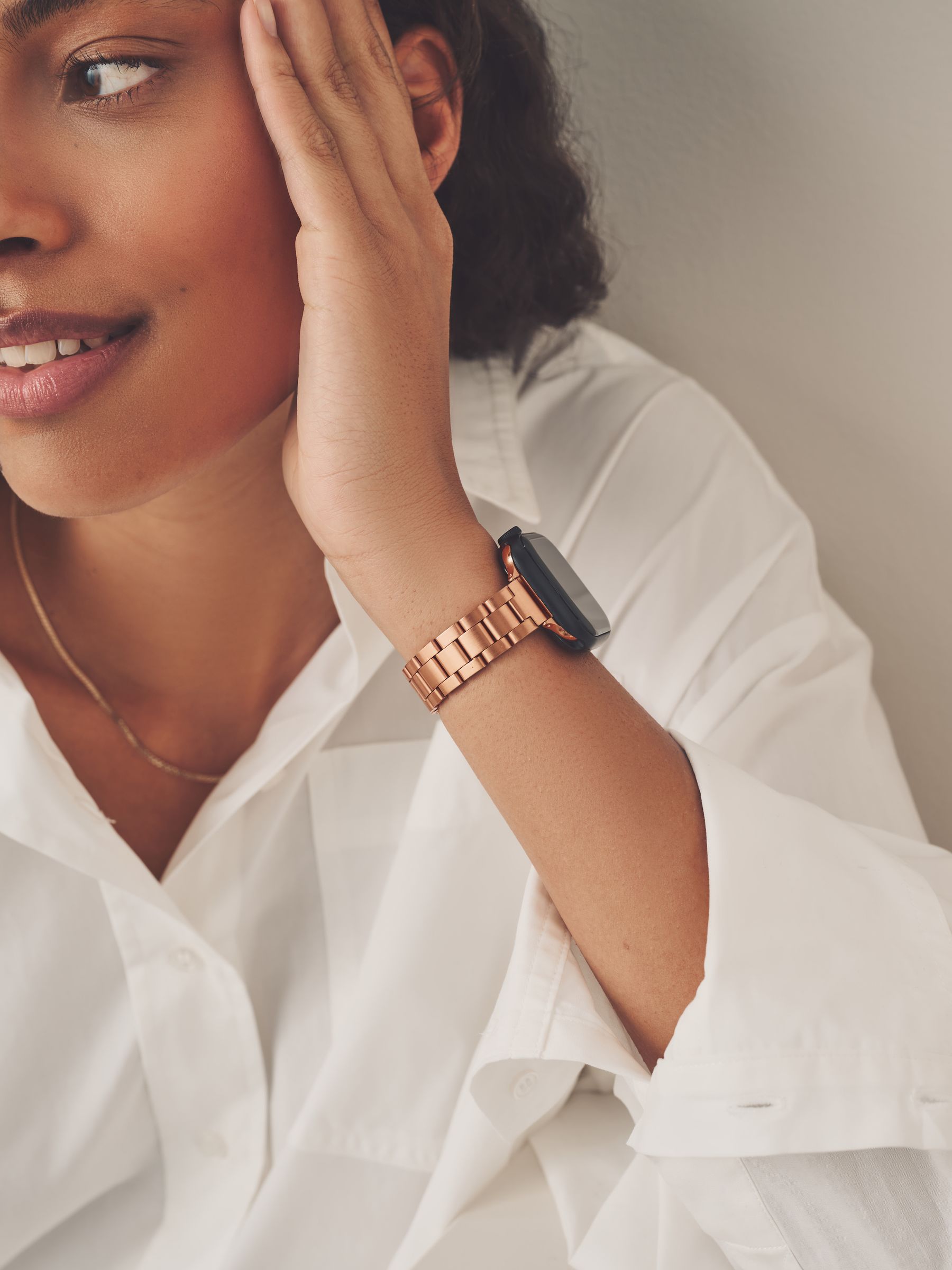 Rose gold stainless steel Apple watch strap, imported from the UK