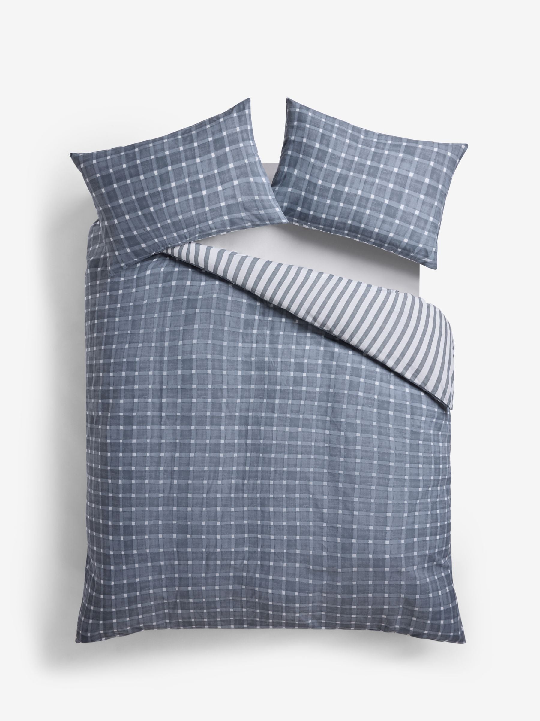 Navy blue check reversible duvet cover and pillowcase set, imported from the UK