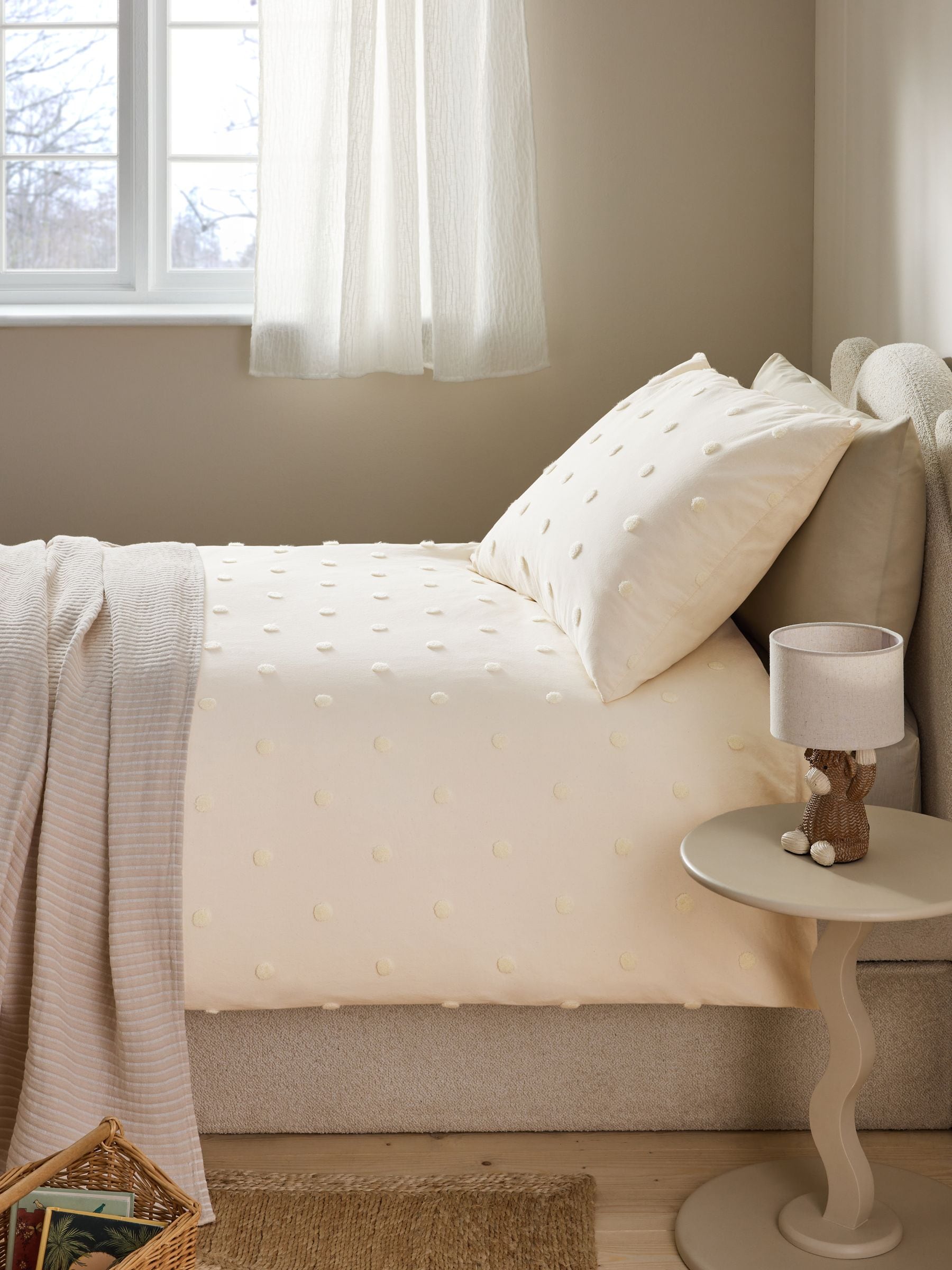 Natural tufted spot duvet cover and pillowcase set, imported from the UK