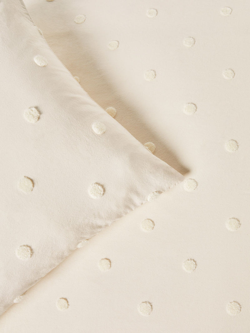 Natural tufted spot duvet cover and pillowcase set, imported from the UK