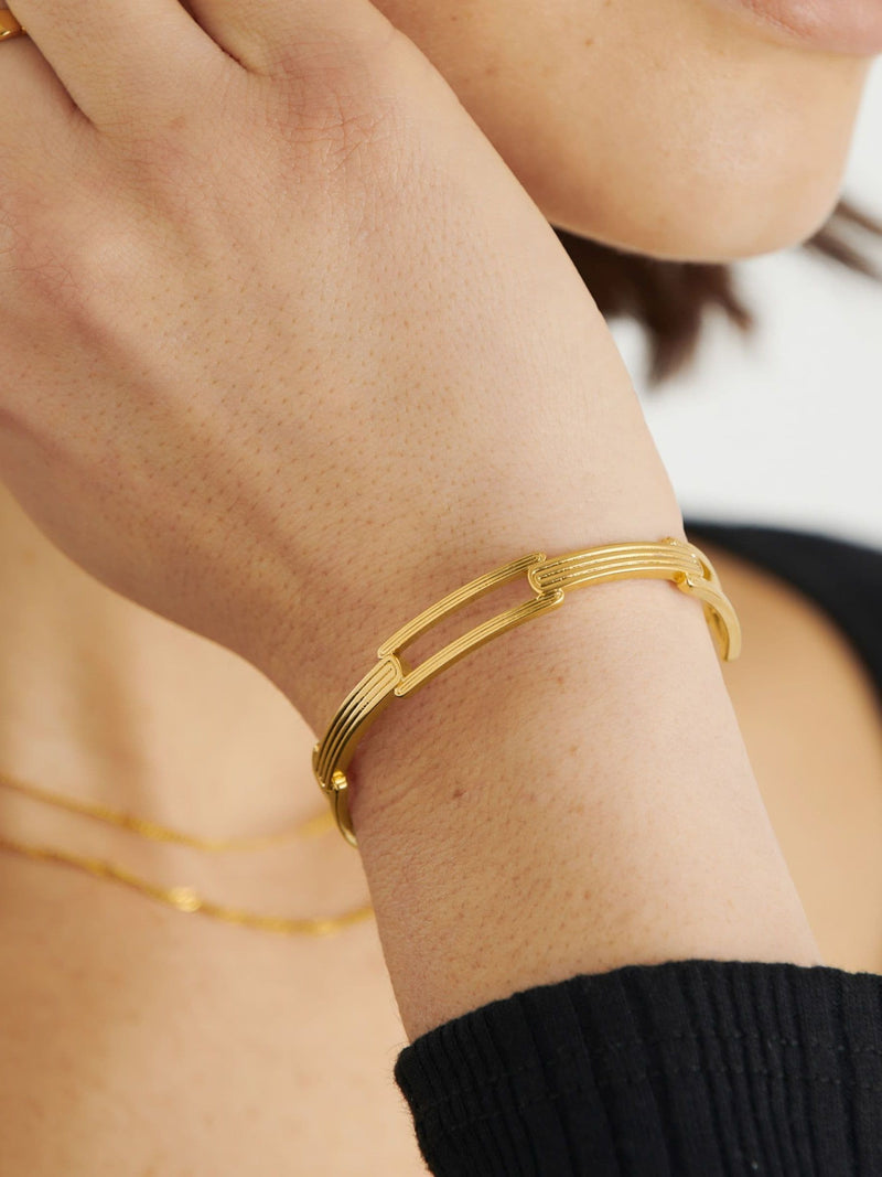 Gold Tone Waterproof Bangle with 18K Gold PVD Coating and Suede Pouch