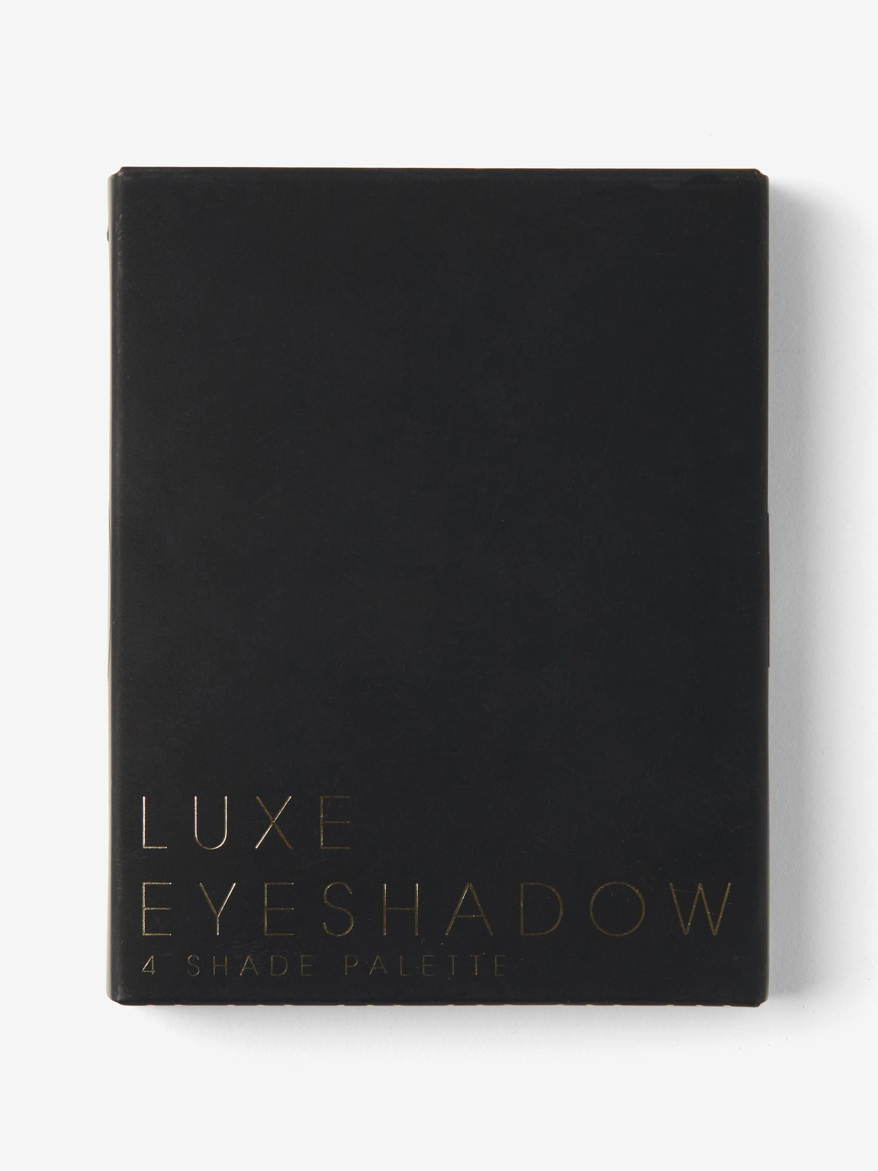 4-shade luxe eyeshadow palette (British brand)