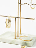 Oliver Bonas gold metal and marble wiggle jewellery stand, imported from the UK