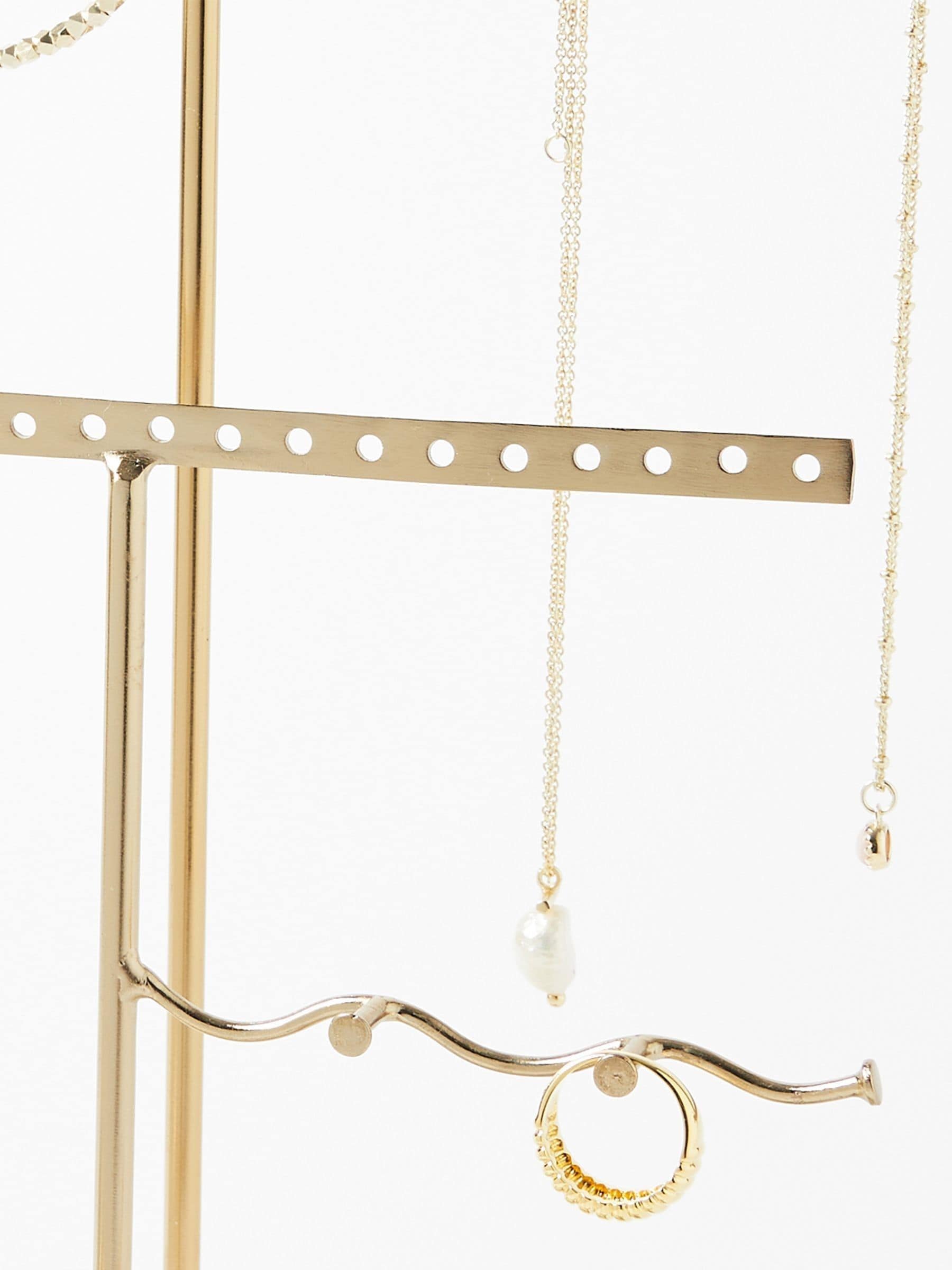 Oliver Bonas gold metal and marble wiggle jewellery stand, imported from the UK