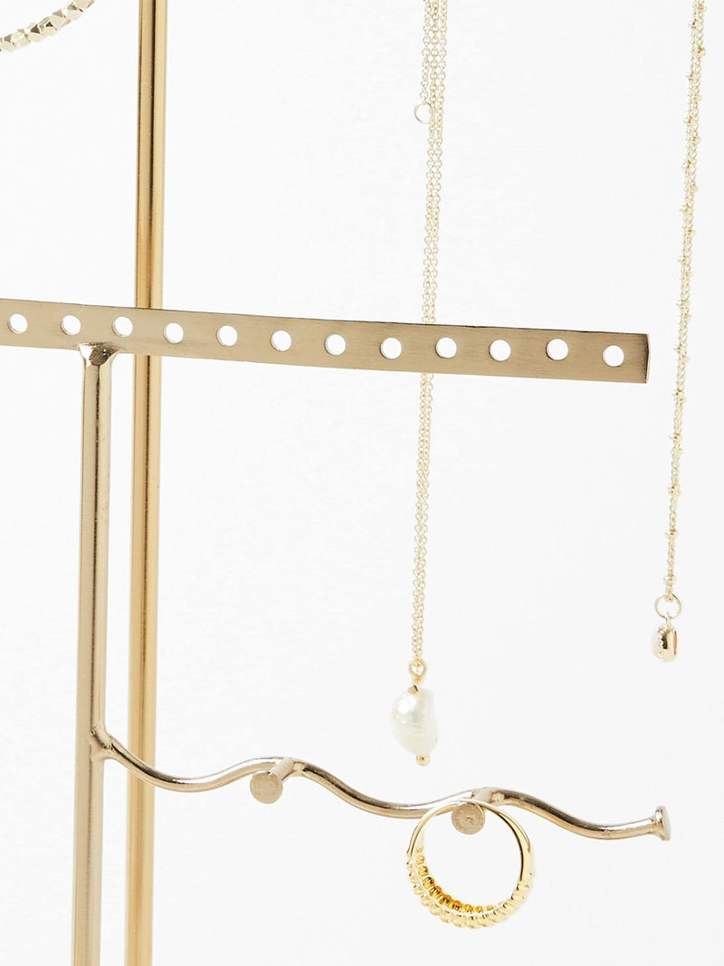 Oliver Bonas gold metal and marble wiggle jewellery stand, imported from the UK