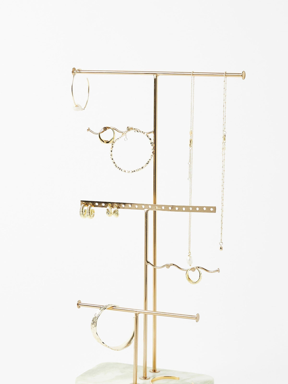 Oliver Bonas gold metal and marble wiggle jewellery stand, imported from the UK