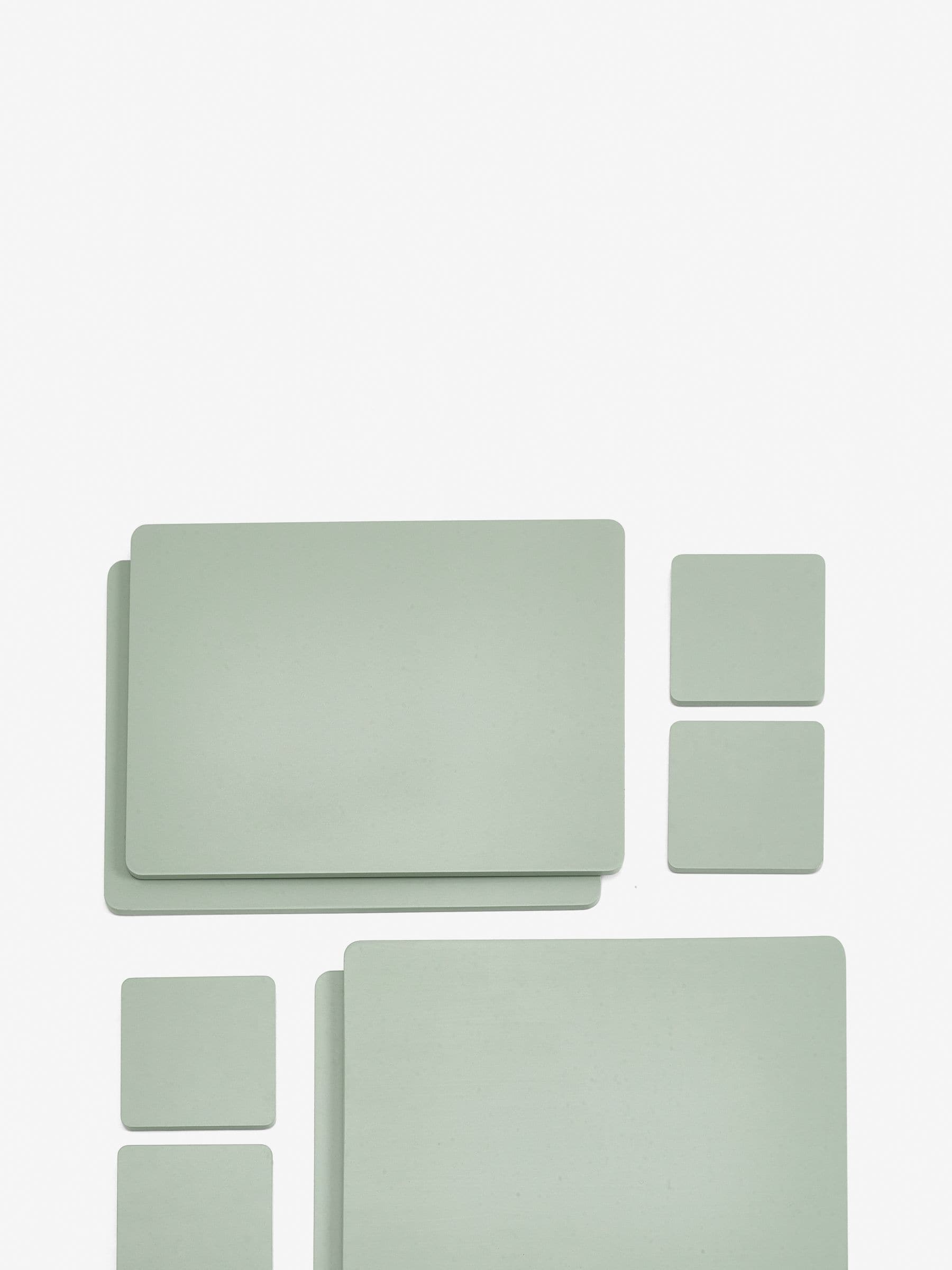 Set of 4 sage green wooden placemats and coasters (British brand)