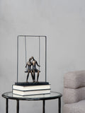 Libra Interiors bronze couple on swing sculpture 37cm height, UK version
