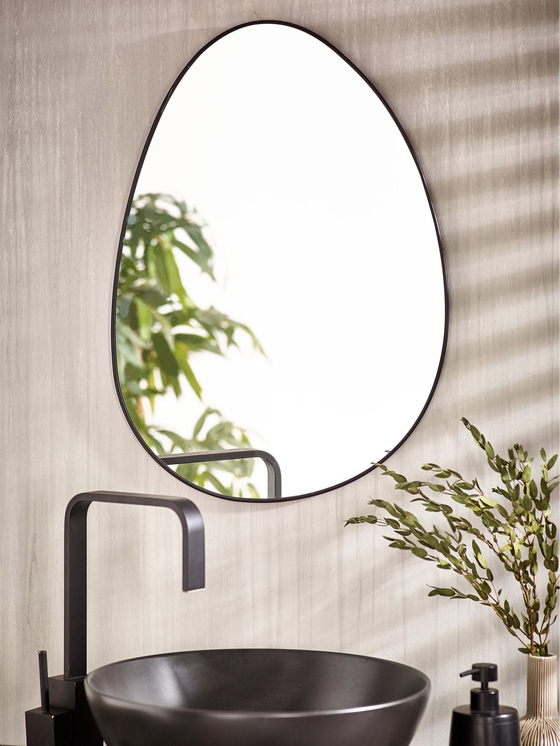 Black pebble round bathroom wall mirror, 62cm x 43.5cm - British product