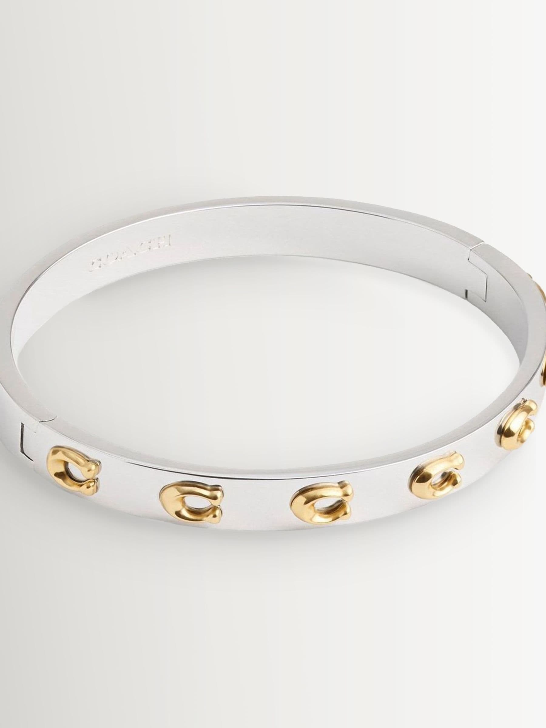 Silver and Gold-Tone Hinged Bangle Bracelet