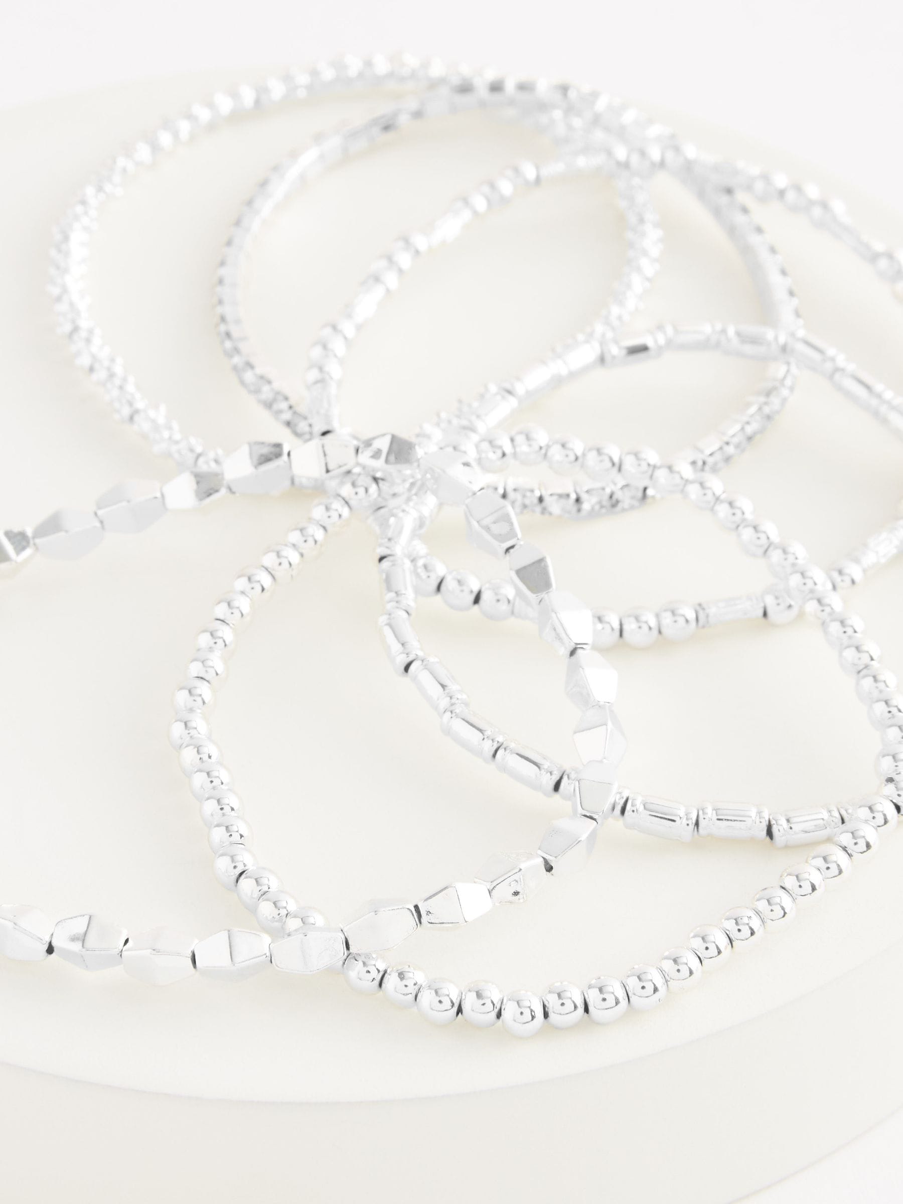 Silver tone sparkle stretch bracelets pack (British brand)