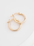 Gold plated sterling silver mini hoop pierced earrings, UK version