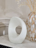 White pleated stoneware ornament with abstract shape (British brand)